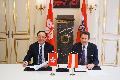 On behalf of the Hong Kong Special Administrative Region Government, the Secretary for Innovation and Technology, Mr Nicholas W Yang (left), signs a Memorandum of Understanding (MoU) with the State Secretary of the Federal Ministry of Science, Research and Economy of Austria, Dr Harald Mahrer (right), in Vienna today (May 24, Vienna time). The MoU aims to strengthen bilateral co-operation between the two places in technology start-up ecosystems.