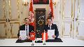 The Secretary for Innovation and Technology, Mr Nicholas W Yang (left), takes a photo with the State Secretary of the Federal Ministry of Science, Research and Economy of Austria, Dr Harald Mahrer (right), in Vienna today (May 24, Vienna time) after signing of the Memorandum of Understanding.