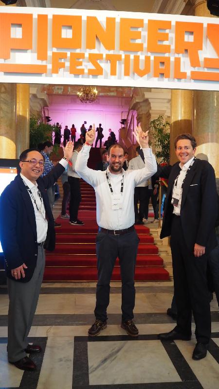 The Secretary for Innovation and Technology, Mr Nicholas W Yang (left), the State Secretary of the Federal Ministry of Science, Research and Economy of Austria, Dr Harald Mahrer (right), Co-founder and Chief Executive Officer of the Pioneers Festival Mr Andreas Tschas (centre) are pictured at the Pioneers Festival today (May 24, Vienna time).