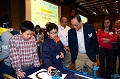 创新及科技局局长杨伟雄（前排左三）今日（十二月四日）出席香港城市大学应用程式实验室举办的「编程一小时」香港区两周年典礼，听取凤溪廖润琛纪念学校的同学介绍作品。 