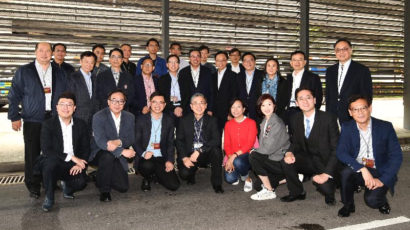 The Secretary for Constitutional and Mainland Affairs, Mr Patrick Nip (second row, fifth right); the Secretary for Innovation and Technology, Mr Nicholas W Yang (second row, first right); and the Secretary for Financial Services and the Treasury, Mr James Lau (front row, fourth left), departed for Shanghai today (April 21) to join the Legislative Council (LegCo) joint-Panel duty visit to the major cities in the Yangtze River Delta Region. Picture shows Mr Nip, Mr Yang, Mr Lau and the Under Secretary for Commerce and Economic Development, Dr Bernard Chan (front row, second right), in a group photo with LegCo members joining the duty visit at the Hong Kong International Airport before departure.