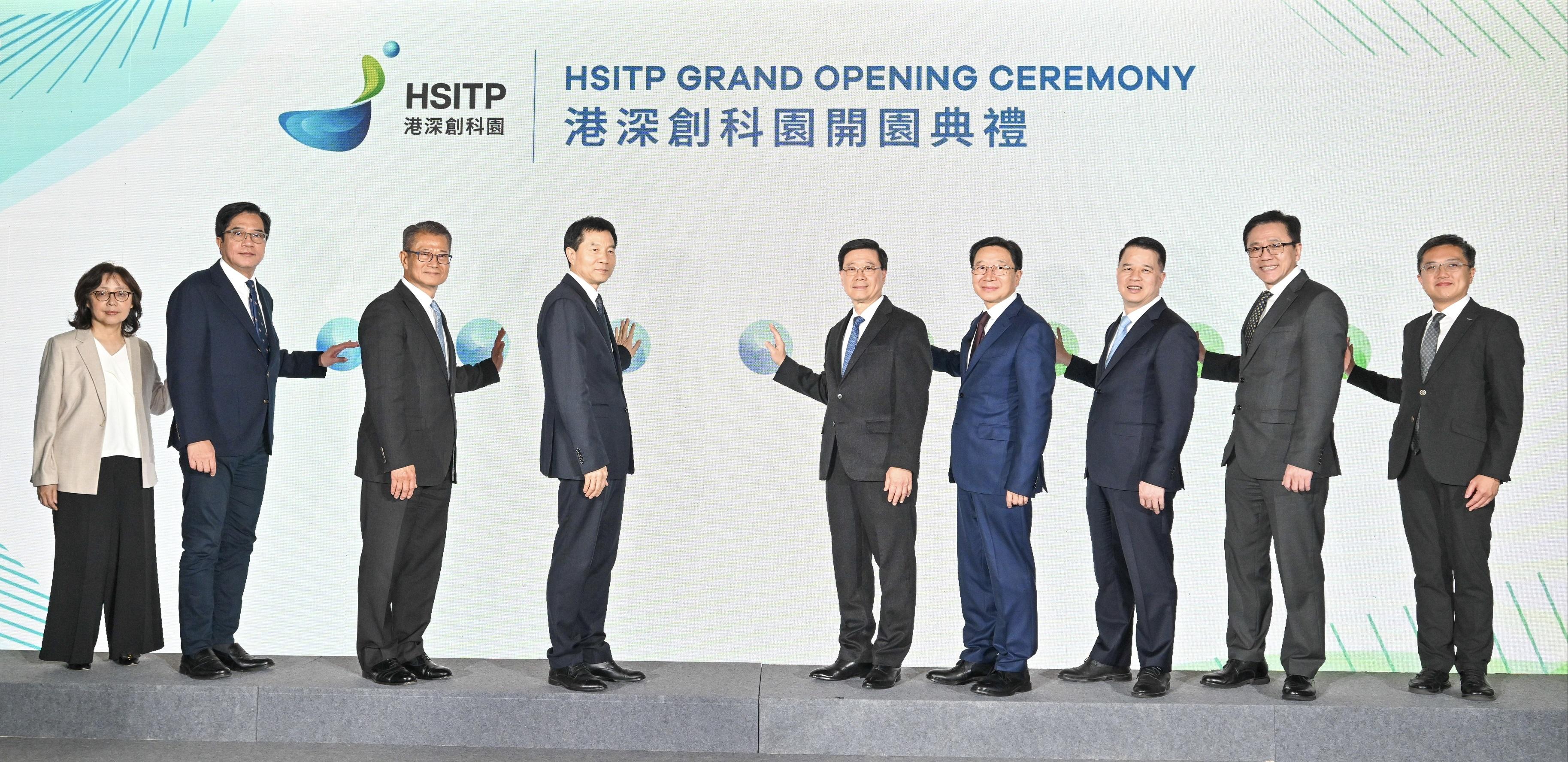 The Chief Executive, Mr John Lee, attended the Hong Kong-Shenzhen Innovation and Technology Park opening ceremony today (December 22). Photo shows (from left) the Secretary for Development, Ms Bernadette Linn; the Deputy Financial Secretary, Mr Michael Wong; the Financial Secretary, Mr Paul Chan; the Executive Deputy Director of the Hong Kong and Macao Affairs Office of the State Council, Mr Xu Qifang; Mr Lee; the Director of the Liaison Office of the Central People's Government in the Hong Kong Special Administrative Region, Mr Zhou Ji; Vice Mayor of Shenzhen Mr Luo Huanghao; the Secretary for Innovation, Technology and Industry, Professor Sun Dong; and the Permanent Secretary for Innovation, Technology and Industry and Chairman of the Hong Kong-Shenzhen Innovation and Technology Park Limited, Mr Kevin Choi, officiating at the ceremony.